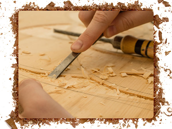 An image of wood carving tools with a sharpened cutting edge.