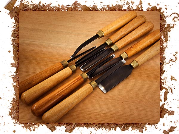 An image of clean wood carving gouges and tools.